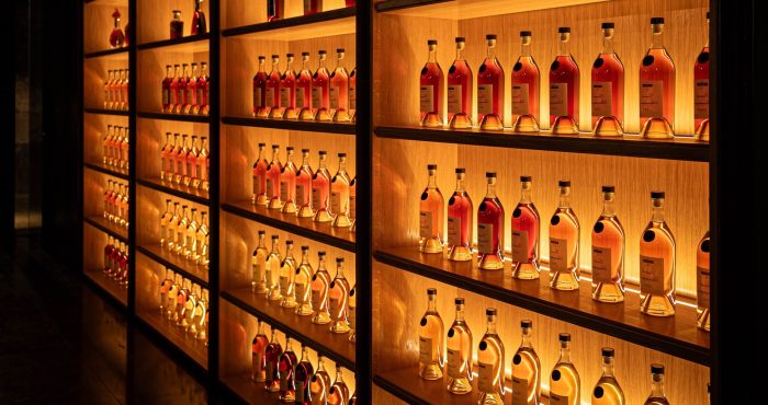 Wall of Cognac bottles